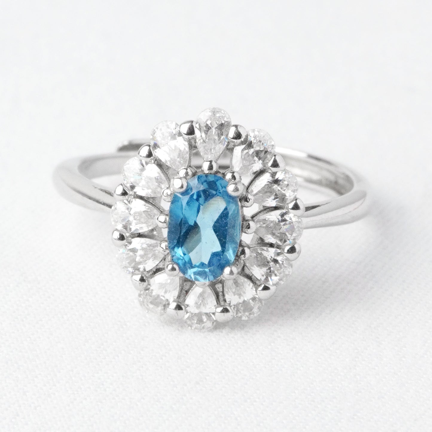 Anello Fiore di Luce – Topazio London Blue
