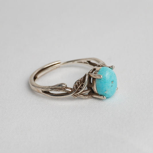 Anello in argento 925 con turchese - Design a rami intrecciati