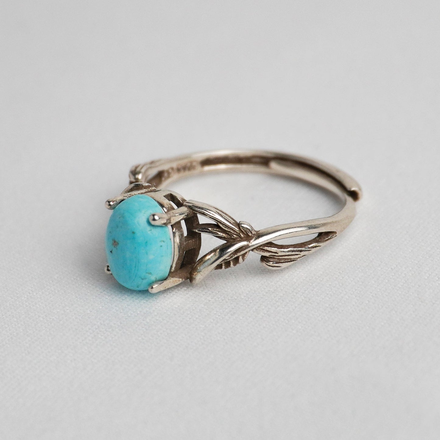 Anello in argento 925 con turchese - Design a rami intrecciati